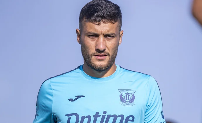 Óscar, Dmitrovic, Sáenz y Neyou, con el grupo